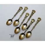 A set of 6 golf decorated teaspoons est: