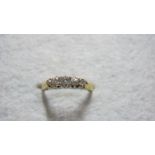 A five stone graduated diamond ring, siz