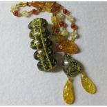 A Polish amber bracelet and necklace est: £25-£50