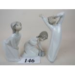 Three Lladro figures modelled as childre