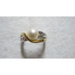 A 14ct white and yellow gold ring, inset
