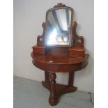 A Victorian mahogany demi lune dressing