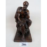 A skillfully carved wooden statue depict