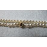 A strand of individually knotted pearls