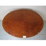 A 19th Century oval quarter veneered occ