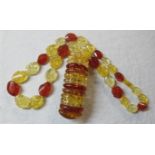 A Polish amber bracelet and necklace est