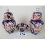 A pair of Japanese Imari, covered vases,