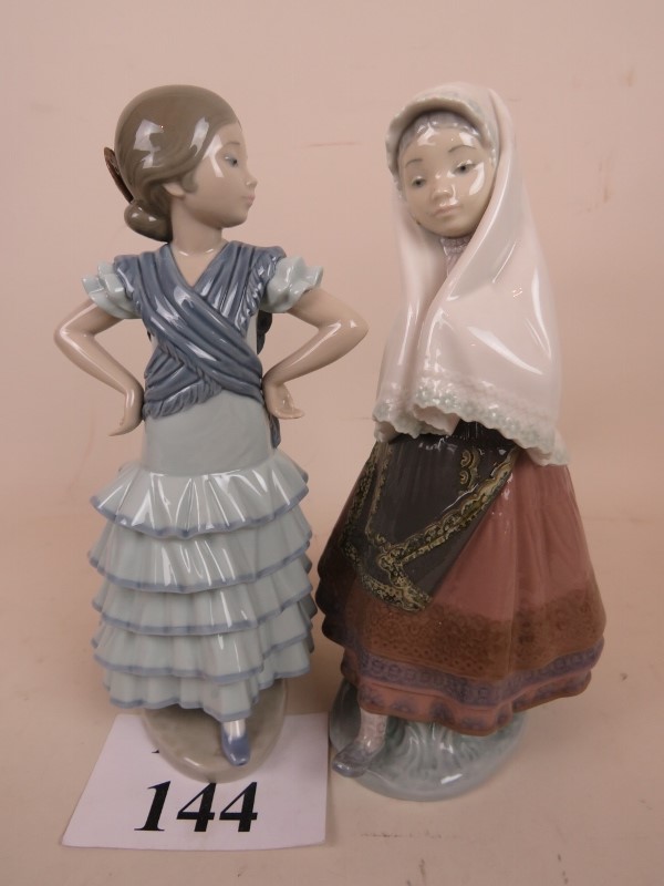 Two Lladro figures depicting a girl flam