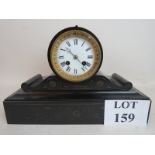 A 19th century marble 'drum' cased chiming mantel clock with incised decoration,