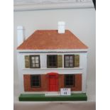 Large wooden dolls house from the 1930's with fitted interior,