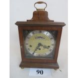 A good quality 20th century Georgian-style walnut cased chiming bracket clock est: £50-£80