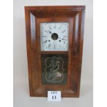 A 19th century American chiming wall clock by Ansonia, with reverse painted glass door,