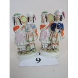 A pair of 19th century Staffordshire pottery flat back figure groups,