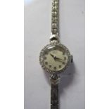 A ladies 9ct white gold diamond set vintage Tudor Royal wristwatch,