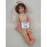 An early 20th century German Simon & Halbig bisque head doll, number '1909',