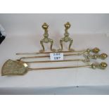 A Georgian-style brass fireside companion set with claw and ball finial's, shovel, tongs, poker,