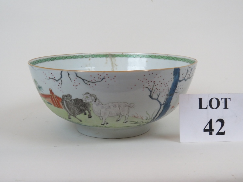 Large Chinese 18th century bowl hand-painted with goats in a garden setting, 26 cm diameter,