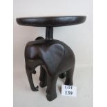 A 20th century African carved hardwood 'elephant; stool,