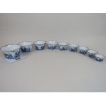 A set of 9 Chinese blue & white enamel 'stacking' bowls, bearing signs of age and wear,