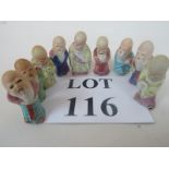 A group of nine early 20th century Chinese hand-painted porcelain miniature figures of wise men,