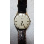 A gentleman's vintage Vertex wristwatch with leather strap est: £200-£300