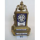 A 19th century ornate French gilt-metal and porcelain cased striking mantel clock,