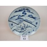 A Japanese blue and white porcelain charger, c.