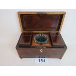 A good quality Georgian mahogany tea caddy with satinwood banding,