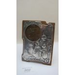 Embossed silver frame depicting mother a