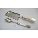 A mother of pearl plated stilton scoop a