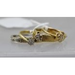 FOUR 18CT GOLD AND DIAMOND RINGS, ring size K