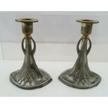 A PAIR OF WMF PLATED CANDLESTICKS of cast two-handled form, tapering to a navette shaped base,