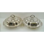 A PAIR OF SHEFFIELD PLATE ON COPPER SQUARE FORM ENTREE DISHES AND COVERS of Georgian design,