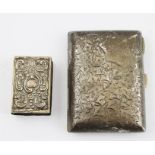 A LATE VICTORIAN SILVER CIGARETTE CASE, having stylised ivy leaf decoration with blind shield