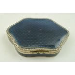 A FRENCH ENAMEL SILVER PILL BOX having blue guilloche enamel hinged cover, set to the border with