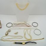 A QUANTITY OF COSTUME JEWELLERY including simulated pearls etc. and an 'Accurist' lady's watch