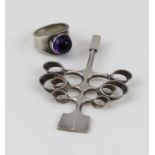 A GEORG JENSEN SILVER RING set with a cabochon amethyst, together with a SILVER DAVID ANDERSEN