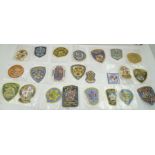 A COLLECTION OF FIFTY EMBROIDERED FABRIC POLICE SHOULDER BADGES and other law enforcement, mainly