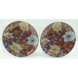 A PAIR OF JAPANESE ARITA PORCELAIN PLATES with floral and gilded decoration, bears the blue script