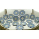 A COLLECTION OF SEVENTEEN WEDGWOOD CHRISTMAS PLATES, pale blue ground ceramic with applied cameo