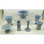 A COLLECTION OF WEDGWOOD PALE BLUE GROUND CAMEO APPLIED CERAMIC ITEMS, includes vases, tazza,