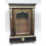 A 19TH CENTURY FRENCH EBONISED AND BOULLE WORK PIER CABINET, having ormuolu mounts, fitted single
