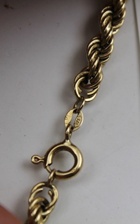 A 9CT GOLD BANGLE of plain hinged form, together with THREE 9CT GOLD NECK CHAINS, a 9CT GOLD - Image 3 of 4