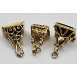 THREE PIECES OF CARVED CAMEO SET JEWELLERY, includes a yellow metal framed brooch, a stick pin and a
