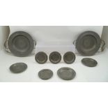 A QUANTITY OF PEWTER WARES, includes two bowls fitted side handles, 26cm diameter, three small