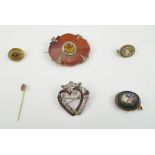 A VICTORIAN MICRO MOSAIC BROOCH, having floral decoration, 2.5cm. together with a heart shape