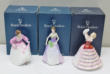 THREE ROYAL DOULTON PORCELAIN FIGURINES, ladies in costume dress including; HN3050 "Susan",