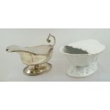 TWO SPOON WARMERS, one silver plate and the other ceramic of scallop shell form (2)