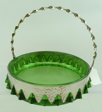 AN ART AND CRAFTS DESIGN SILVER PLATED FRUIT BASKET with green glass liner and up-and-over spiral