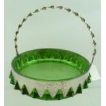 AN ART AND CRAFTS DESIGN SILVER PLATED FRUIT BASKET with green glass liner and up-and-over spiral